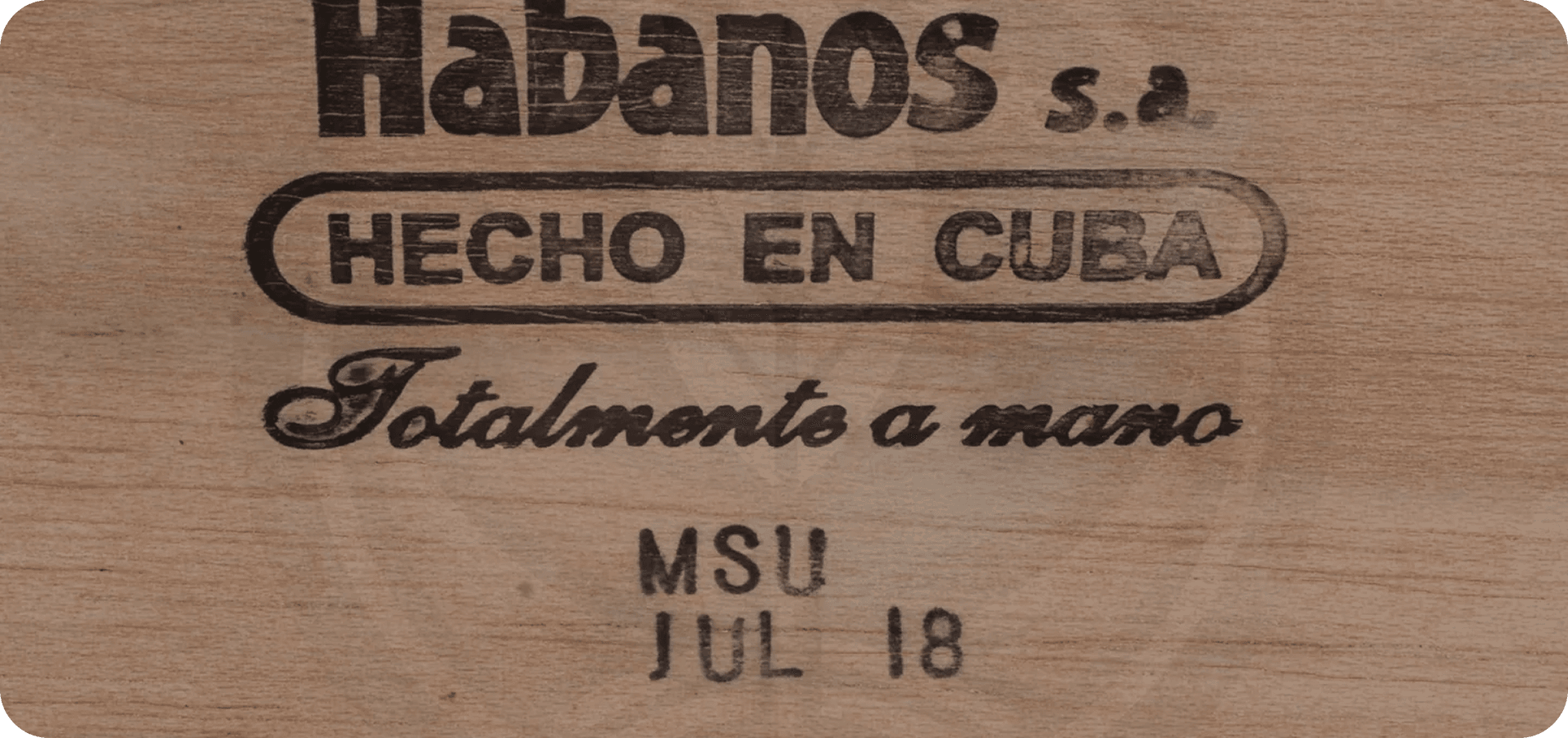 Clear, precise stamps reading “Hecho en Cuba” (Made in Cuba) and “Totalmente a mano” (Handmade)